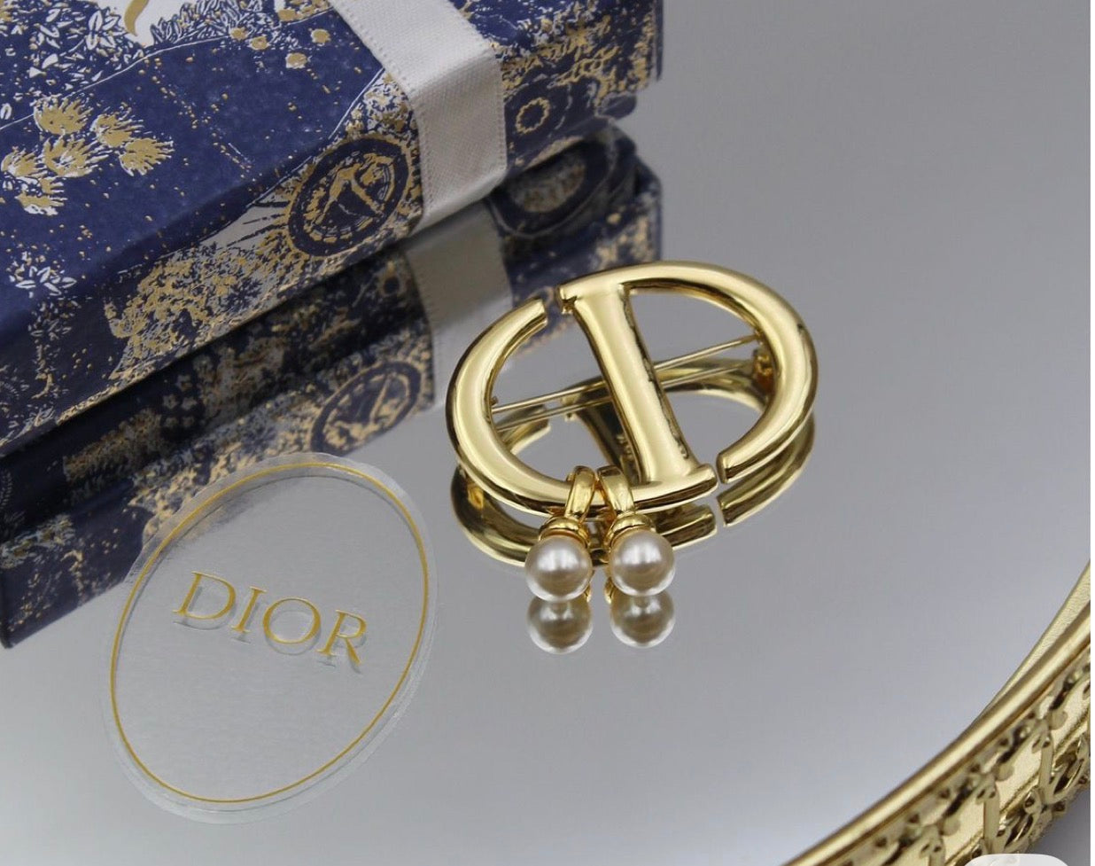 Broche CD