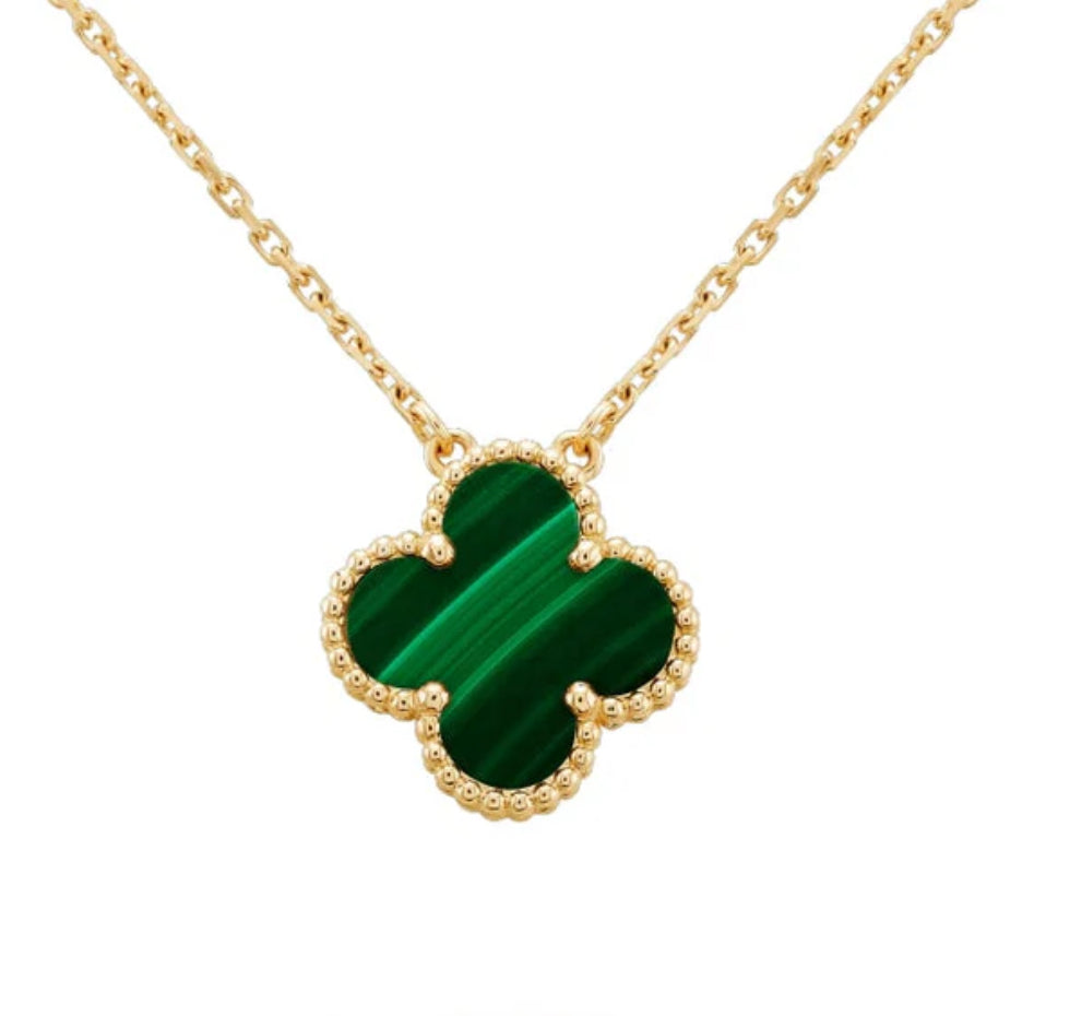 Clover necklace greed
