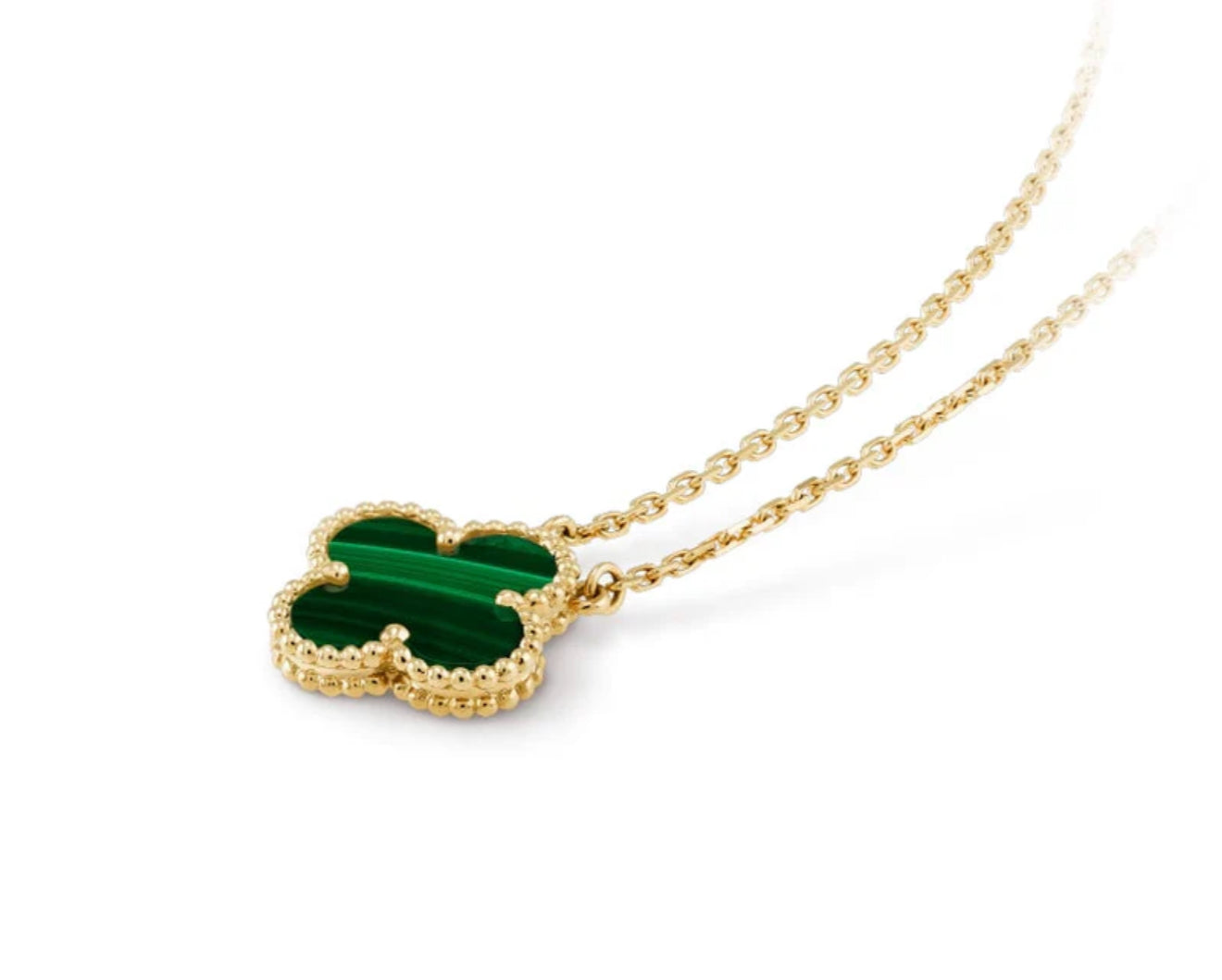 Clover necklace greed