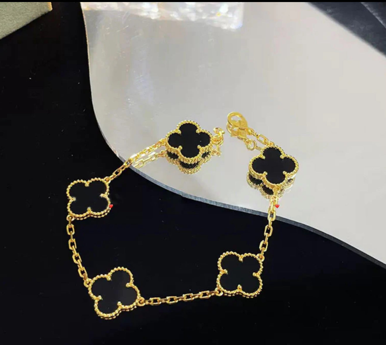 Clover black bracelet.