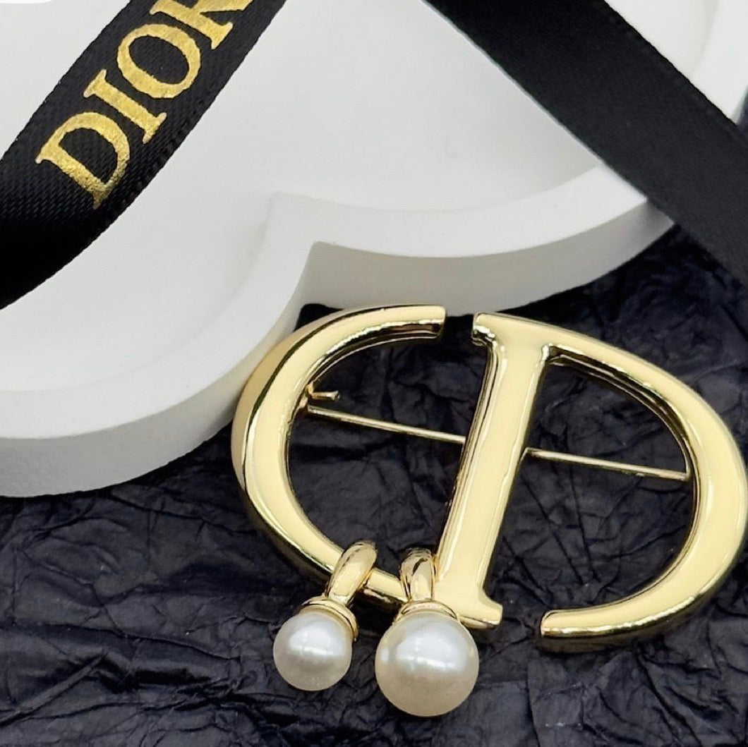 Broche CD