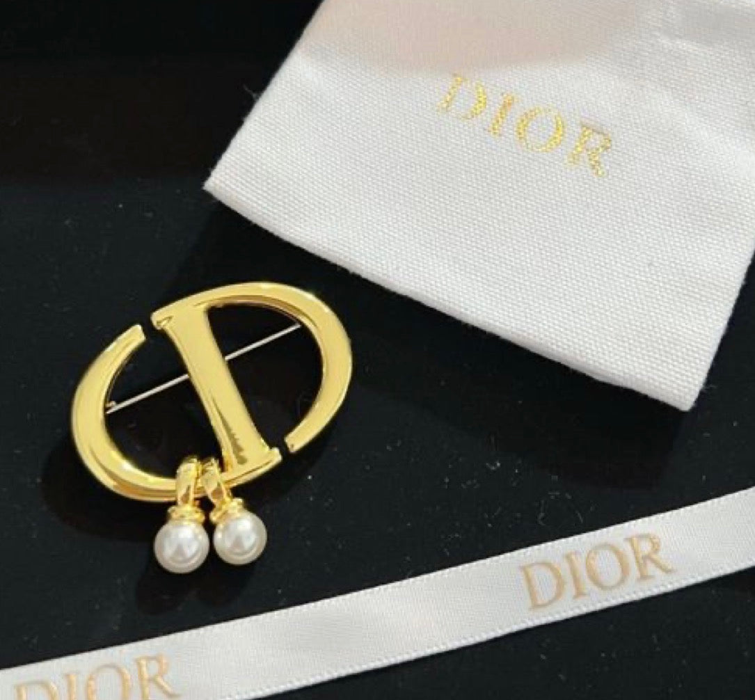 Broche CD