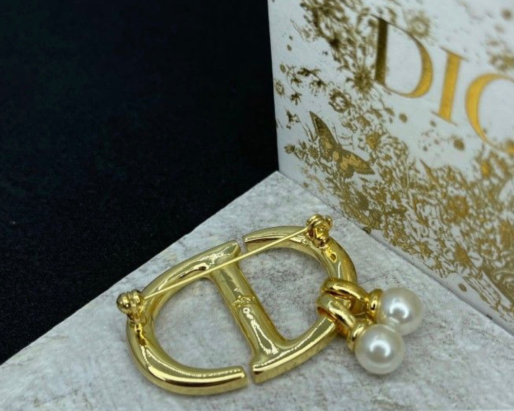 Broche CD